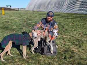 Kelvin Cech at the dog park with Rebis and Dasher.
