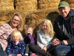 Garrett Hawgood with his wife Kate and three children