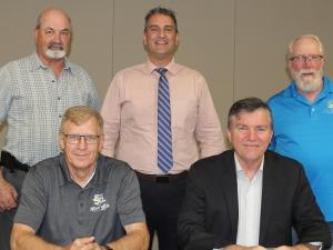 Back row: Councillors Kevin Stott, Nathan Dueck, and Chris Wiebe. Front row: Deputy Mayor John Funk and Mayor Myron Dyck.