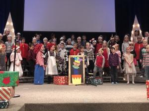 Grades One and Two students perform the Elementary School holiday show.