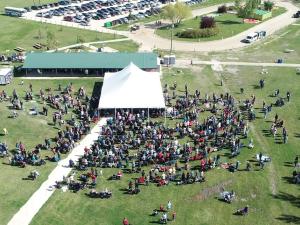 Visitors crowd in around the main tent at Niverville 50th anniversary party in Hespeler Park.