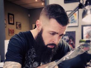 Jason Majury, the owner of Twenty Twenty Tattoo Studio.