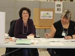 Poll workers at the Niverville town office on Tuesday.