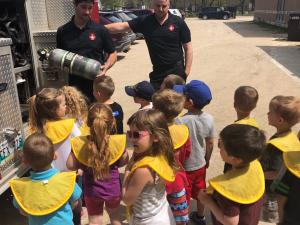 Firefighters give Niverville preschoolers a tour of the town’s fire engine.
