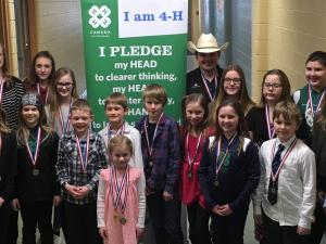 Members of the Sunset Riders 4-H Club gather at the Eastman Zones to deliver speeches.