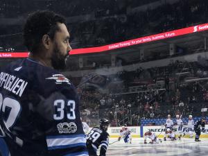 Dustin Byfuglien takes the ice after a long absence due to injury.