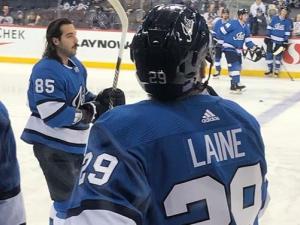Patrik Laine takes the ice at Bell MTS Place.