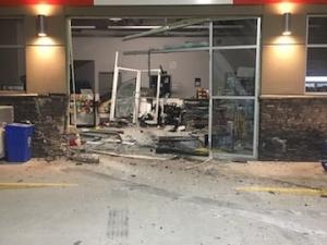 Damage from a truck breaking through the front doors of Niverville Shell.