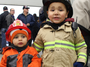 Brody Smith and Lucas Giesbrecht in firefighter gear.