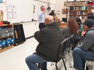 Parents gather to hear Principal Michael Koester and Superintendent Randy Dueck address their concerns.