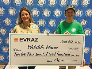 Tara Stokotelny and Joy Kennedy receive a donation cheque