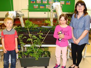 Lynn Gobeil with students Ben and Graci