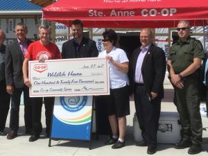 Ste. Anne Co-op presents Wildlife Haven a cheque for $125,00