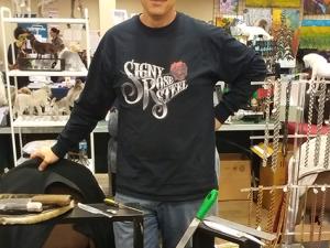 Jon Bardal showing off his wares