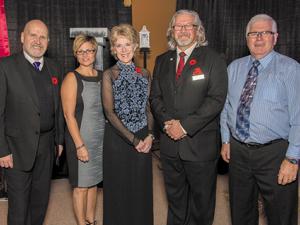 Heritage board members Jackie Ens and Nancy Finlayson, Heritage Centre CEO Steve Neufeld, and board member Terry Carruthers at the 2016 fundraising gala
