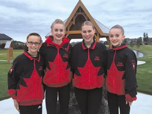 Marcus Zeilstra, Arabella Zeilstra, Dayna Ens, and Juliana Zeilstra sporting their Team Canada jackets.