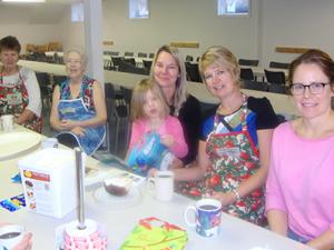 Volunteers: Mary Ann Friesen, Kayloma Capps, Tess Klassen (on lap), Marlene Stott, Meeka Sawatzky, Carisa Klassen
