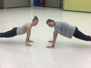 Fitness instructor Mel Smook and Chantel Todd doing a plank