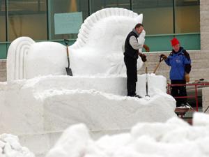 Gary Tessier and Real Berard sculpting the "Toy Trojan Horse" in Ottawa
