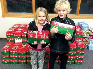 Willa and Max Dowse with their shoebox donations