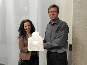 Colleen Dyck receives Business of the Year award from Chamber Director Andy Anderson