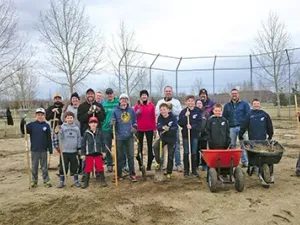 Volunteers clean baseball diamonds in Hespeler Park