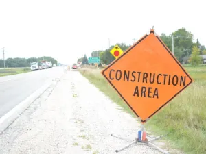 Construction crews begin installing signal bases