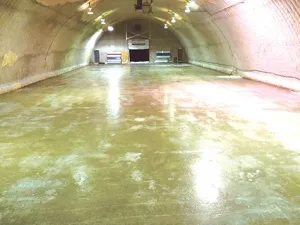 Sand floor at the Niverville Curling Club, where low temperatures have delayed ice making