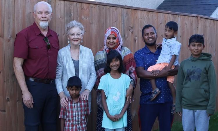 Brent and Ellen Byggdin with Abdul Paten, Sumaia Parvin, and their four children, including five-year-old Jibran.