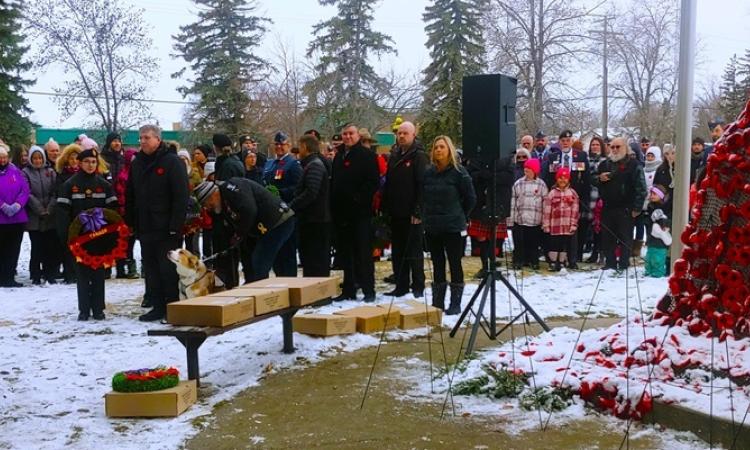 The community gathers at the cenotaph in Niverville.