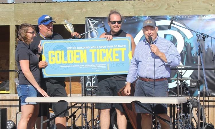 Stephen McCabe and Kurt Carter of Lorette accept the grand prize at the first annual Niverville Smokemaster BBQ Competition.