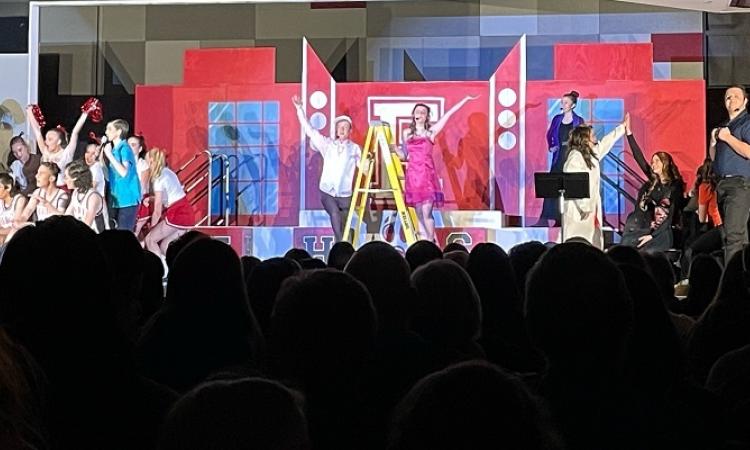 On April 12–14, students and volunteers at Niverville High School presented their first-ever full-length musical since the construction of the new school in 2019.
