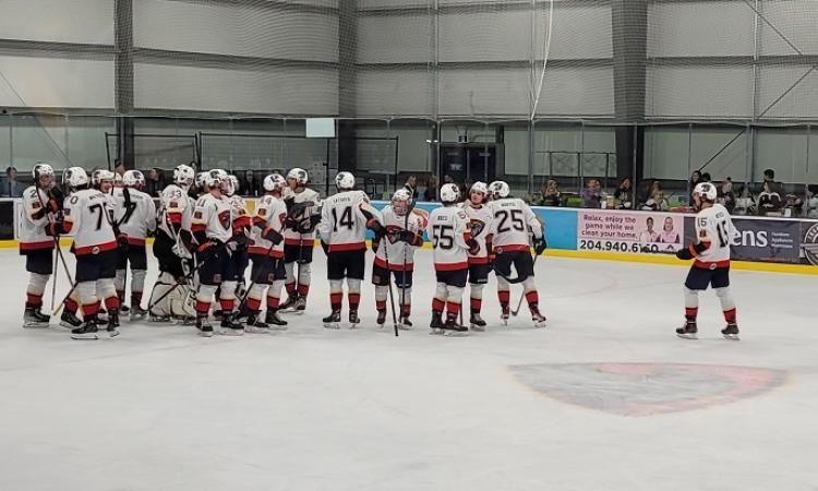 The Nighthawks celebrate their hard-fought victory over the OCN Blizzard on October 23.
