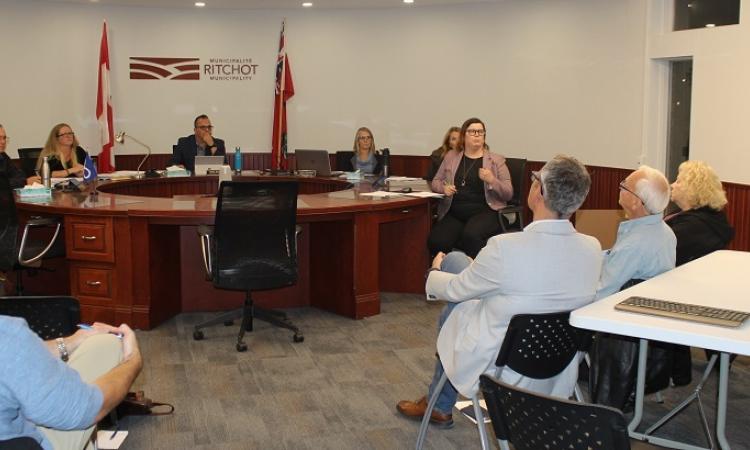 A public hearing is held for the community to respond to the proposed new Macdonald-Ritchot development plan.