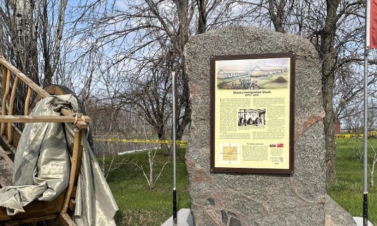 The historical cairn marking the site of the Shantz immigration sheds two miles south of Niverville.
