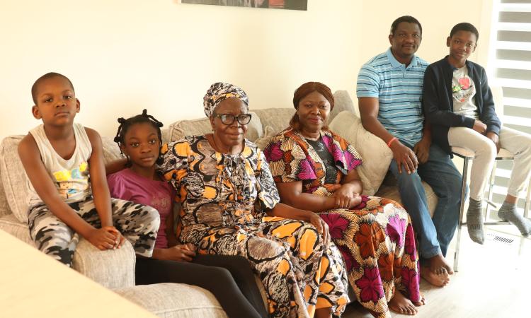 The Okubule family, including their visiting grandma.