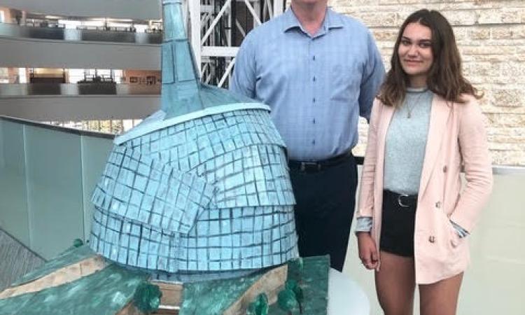 Human Right Museum CEO Dr. John Young with Maddie Thompson of Niverville.