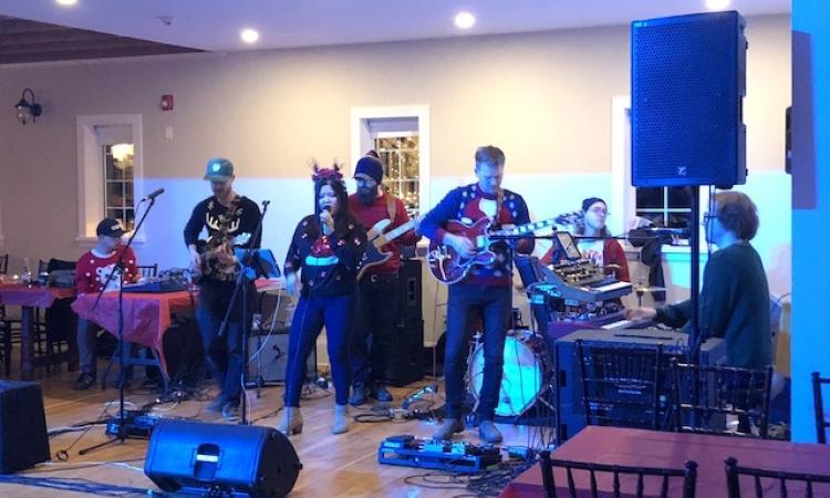 Last Call puts on a show at their holiday dance party.