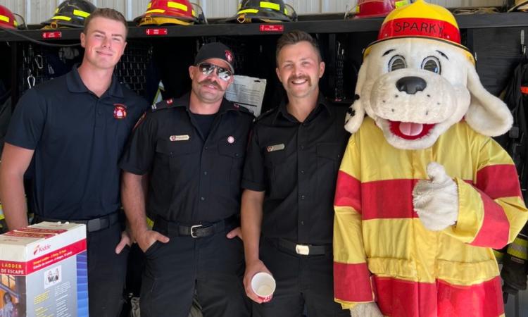 Niverville firefighters with Sparky the Fire Dog at this year's fire department open house.