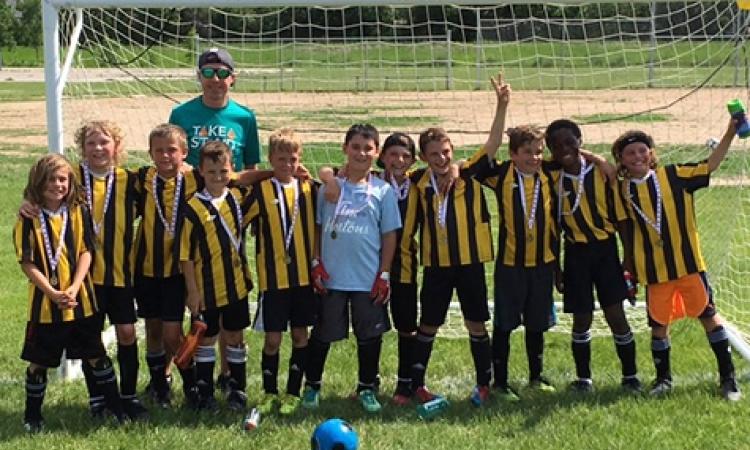 Coach Todd Neil, (l-r) Kerrick Neil, Max Dowse, Tom Bray, Raine Doiron, Dallin Hornung, Zachary Normand, Kaleb Collette, Micah Penner, Levi Brandt, Michael Olatundun, Ethan Bowyer