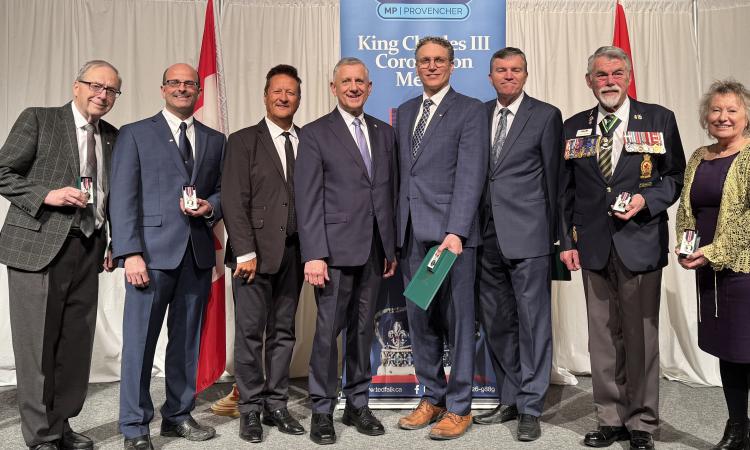 Roger Armbruster, Joel Lemoine, Ron Schuler, Ted Falk, Ray Dowse, Myron Dyck, Paul Rhodes, and Shirley Hoult.