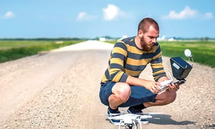 Filmmaker Josiah Speers in the field