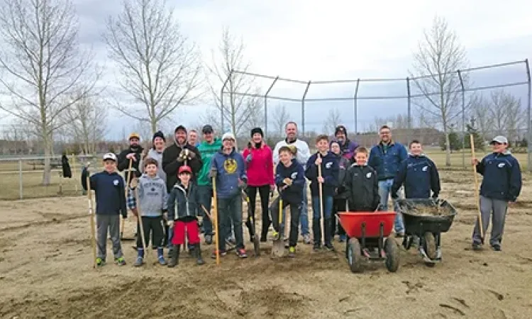 Volunteers clean baseball diamonds in Hespeler Park