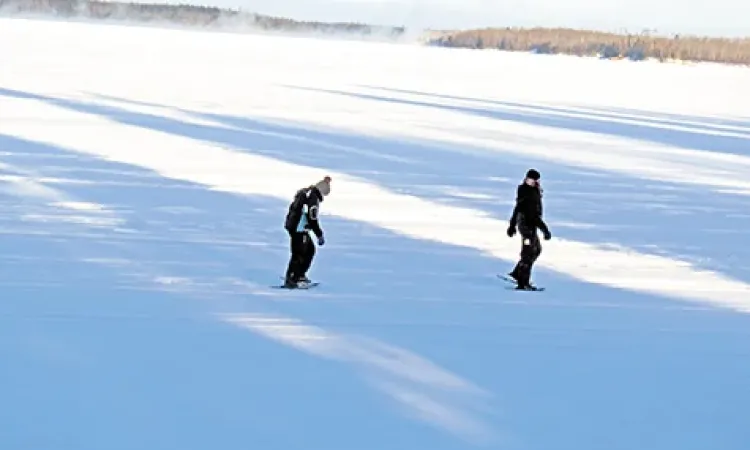 Chantel Gadient and Mackenzie Scarf snowshoeing in the Whiteshell