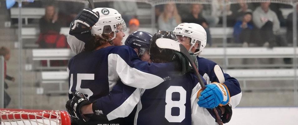The Nighthawks celebrate in early preseason action at the CRRC.