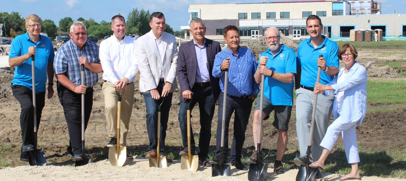 Councillor John Funk, Clare Braun, MLA Shannon Martin, Mayor Myron Dyck, MP Ted Falk, Minister of Infrastructure Ron Schuler, Councillor Chris Wiebe, Councillor Nathan Dueck, and Libby Hanna.