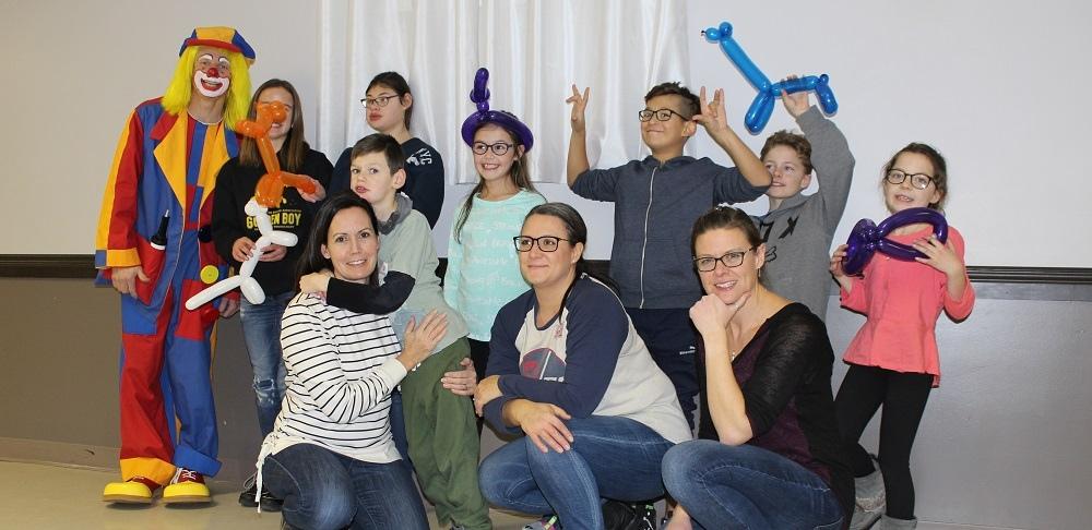 MoveNGroove participants at their annual birthday party, with organizers Laurie Loeppky, Lisa Sakwi, and Leah Dyck.