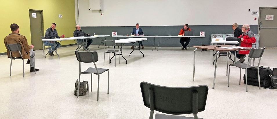 Physical distancing measures are being taken at town council meetings.