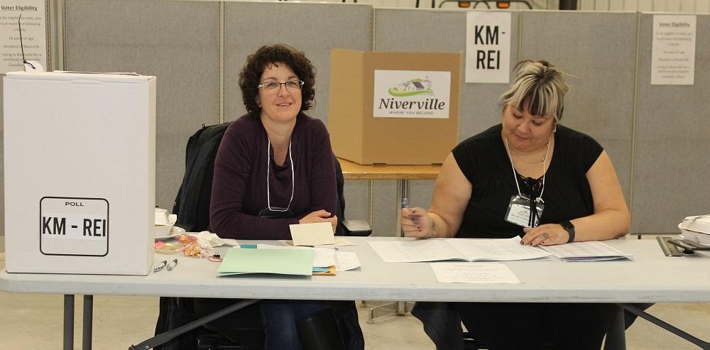 Poll workers at the Niverville town office on Tuesday.