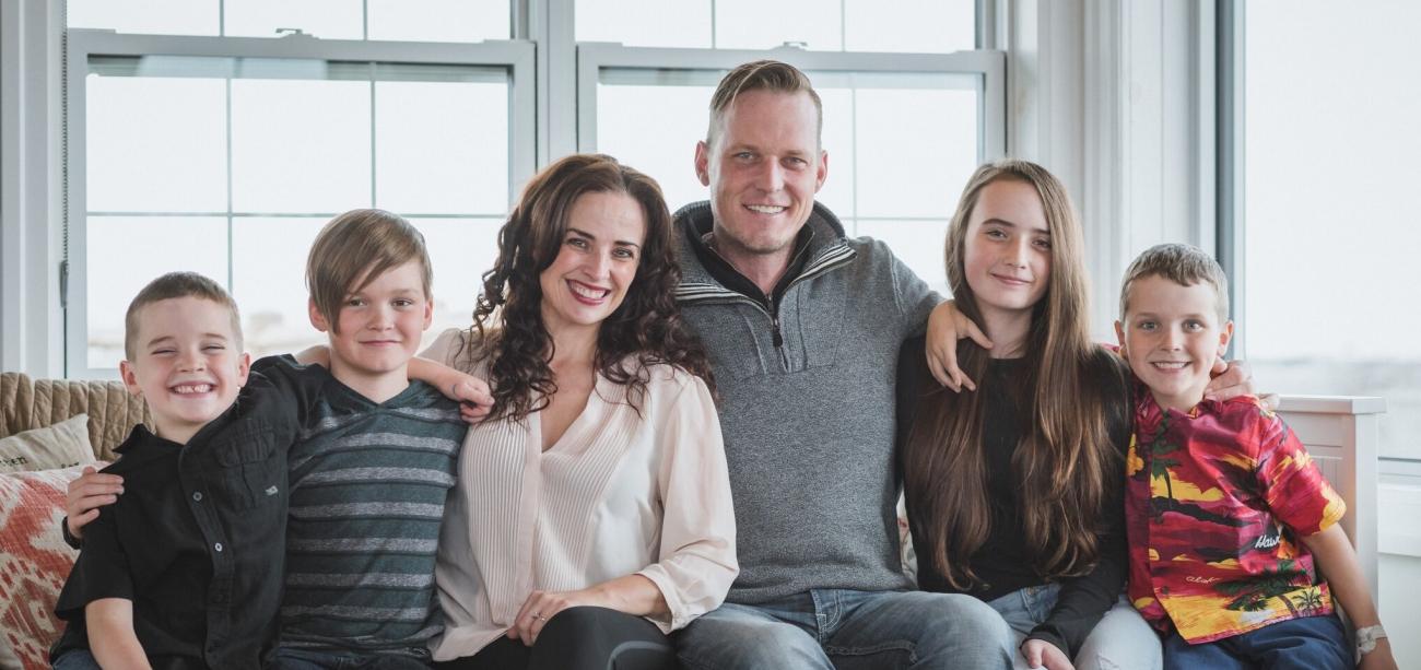 Colleen and Grant Dyck alongside their four children, Moses, Leo, Oskar, and Georgia.